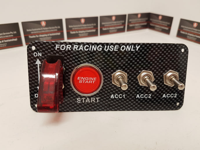 Race car engine start switch panel.